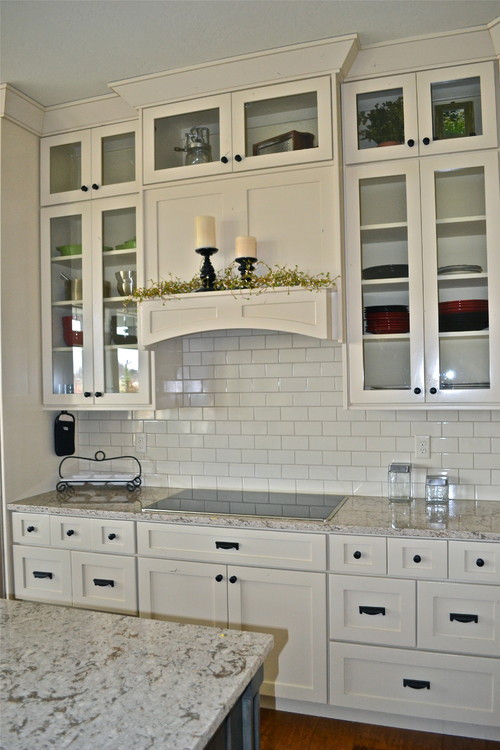 Cambria Windermere with Glass Door Off White Wall Cabinets, Ceramic Suwbay Tiles and Wooden Arched Vent Hood